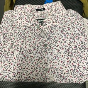 Long sleeve dress shirt. Size Medium Pinkish and purple flower pattern